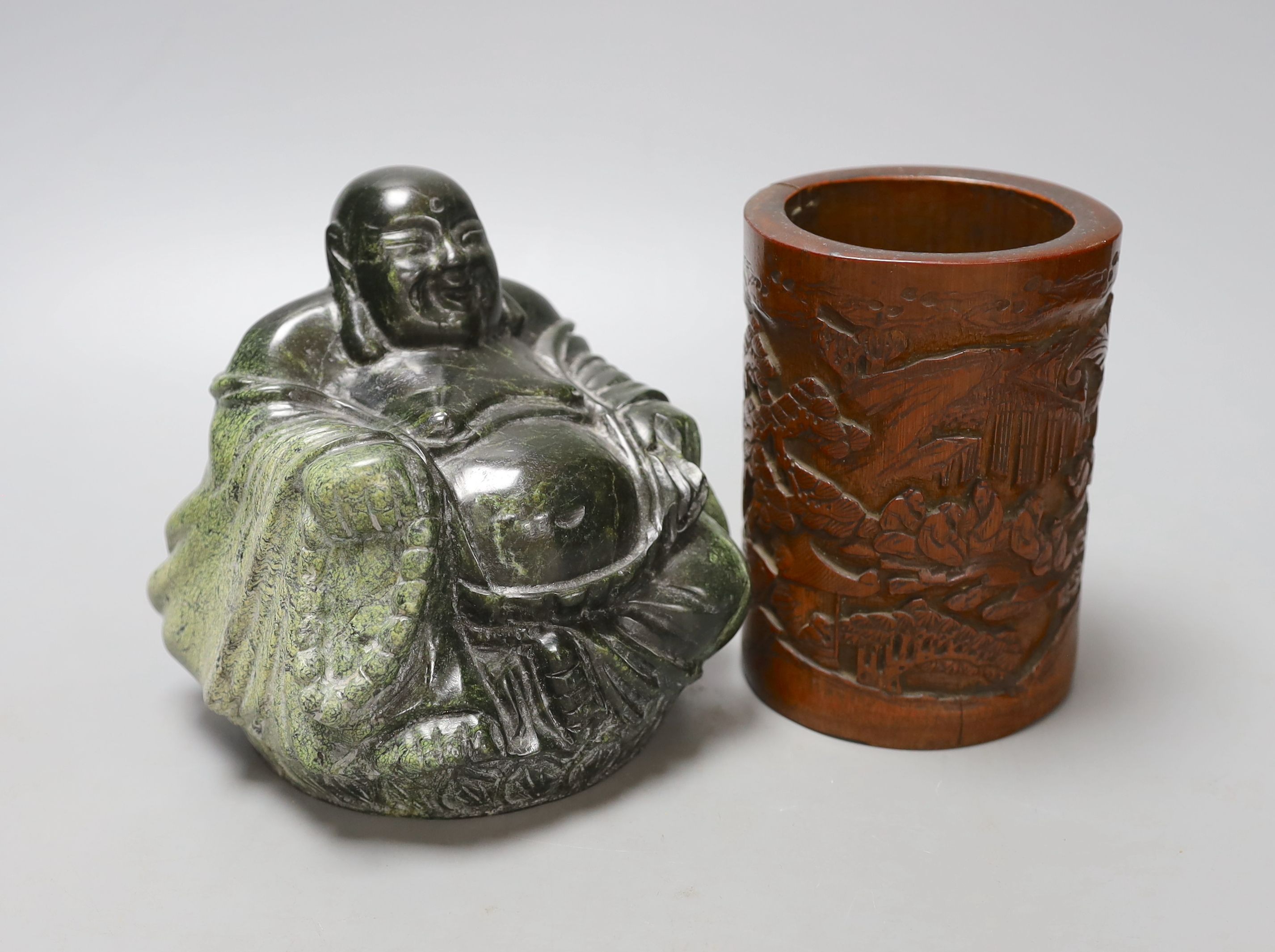 A Chinese bamboo brush pot, 13cm tall, and a green hardstone figure of Budai